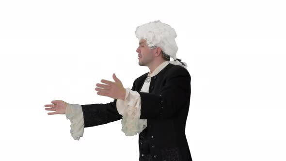 Man Dressed Like Wolfgang Amadeus Mozart Conducting an Orchestra on White Background. alt