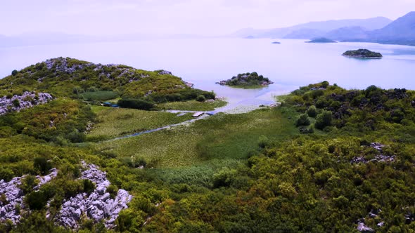 Small islands with a marshland and reeds in the middle,lake Skadar,Montenegro. alt