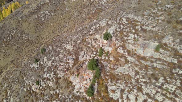 Flight of the Camera From Bottom To Top Over the Mountain alt