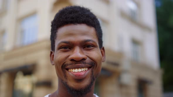 Cheerful African Man Posing City alt