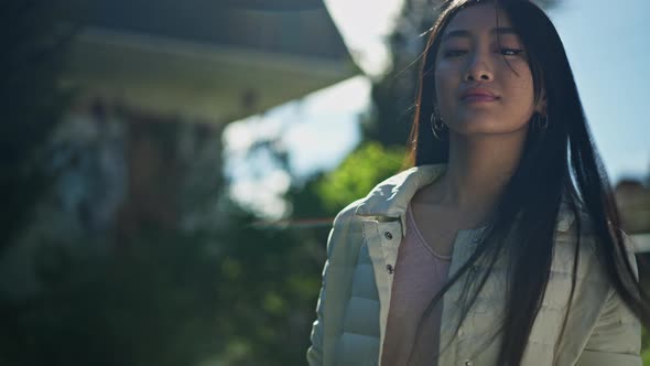 Portrait of Young Charming Asian Woman Posing in Summer Spring Garden Outdoors alt