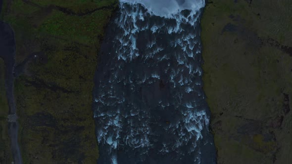 Aerial Birds Eye Overhead Top Down Panning Footage of Flowing River in Countryside to Waterfall alt