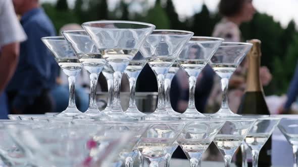 Pyramid or Tower of Glasses for Champagne Performance at the Party