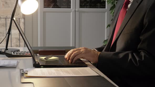 Businessman Working with Laptop Computer
