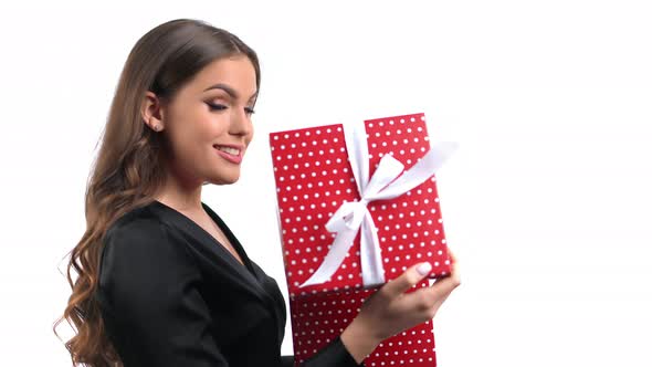 Portrait Beautiful Woman Open Wrapped Red Gift Box Amazement Surprise Face Expression Isolated alt