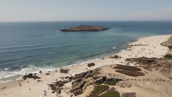 Aerial pullback from Pessegueiro Island reveal Nossa senhora da Queimada Fort, Porto Covo