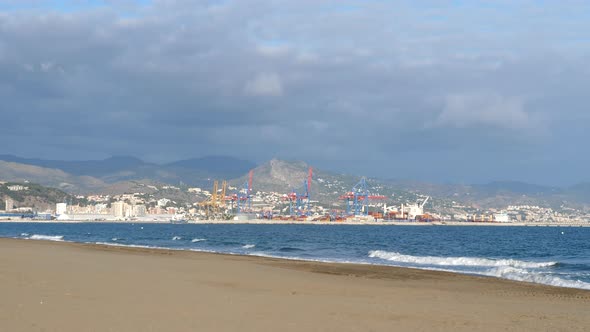Malaga seen from beach on sunny day. Static alt