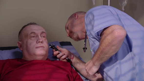 Senior man is examined at hospital