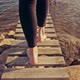 Woman Walking Barefoot on Jetty - VideoHive Item for Sale