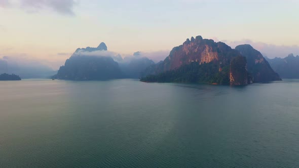 Aerial View Mist On The Top Of The Hill In The Green Lake. alt