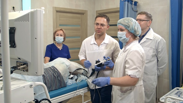 Medical team preparing for endoscopic surgery
