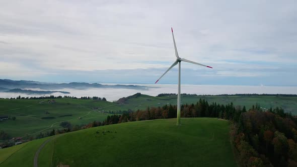 Aerial video of a wind turbine from above in Entlebuch, Switzerland
