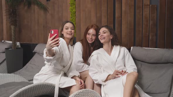 Blonde Female Take Photo Make Selfie With Girlfriends In Spa Center