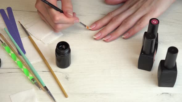 Applying a Base Coat Before Coating Nails with Nail Polish Self Manicure at Home alt