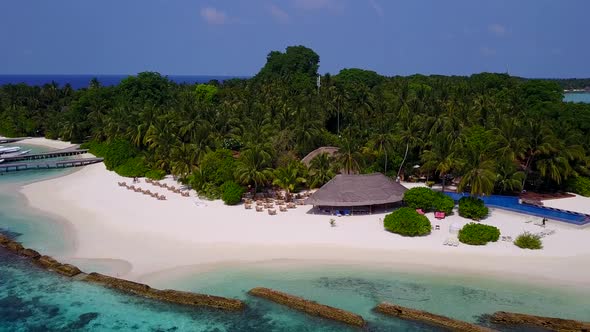 Aerial drone scenery of seashore beach by blue sea and sand background alt