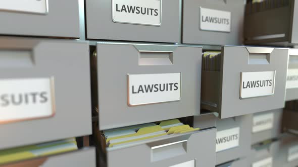 LAWSUITS Text on the Drawers of a File Cabinet alt