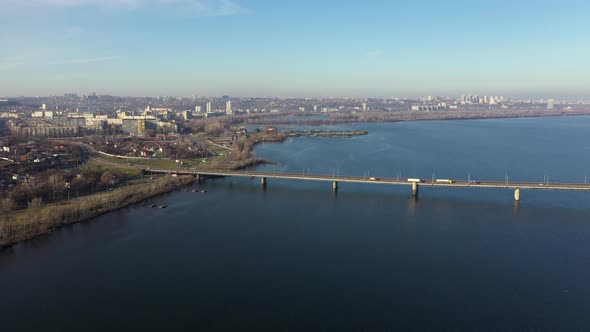 Aerial View of the Central Business Part of the City of Dnipro. Cars Go To the South Bridge