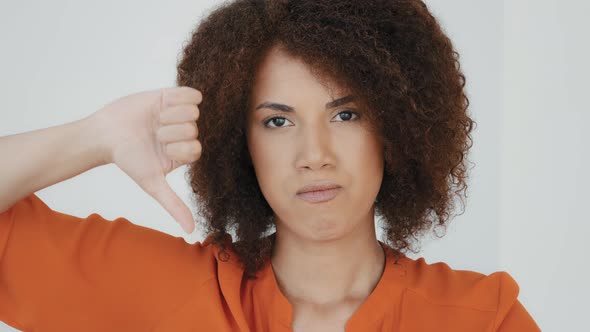 Close Up African American Millennial Sad Frustrated Disappointed Woman with Curly Hair Girl Looking alt