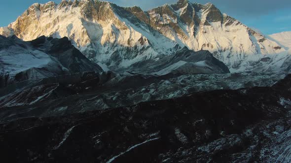 Nuptse Mountain and Lhotse South Face at Sunset. Himalaya, Nepal. Aerial View alt