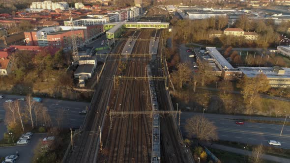 Aerial View of Train Arriving to Station