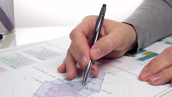 Businessman Analyzes Report alt