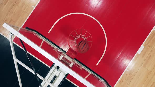 Top View of an Attempt to Throw a Basketball Into the Basket alt