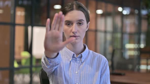 Stop Gesture By Young Woman Disliking and Rejecting alt