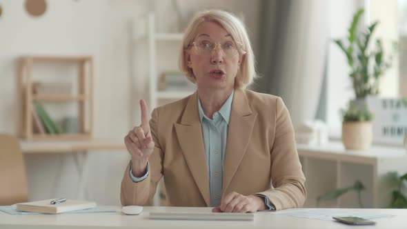 Irritated Female Boss Giving Instructions on Meeting alt