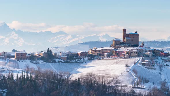 Pan: Italy Piedmont panoramic winter snow view wine yards unique landscape at sunset alt