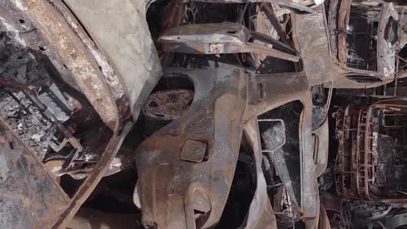 Vertical Video of Wardestroyed Cars in Ukraine alt
