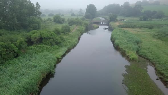 Beautiful sky view of the river otter in East Devon, South West England. Lot's of wildlife and woodl alt