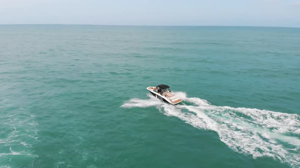 Tourists Riding Motorboat At Poniente Beach On Costa Blanca In Benidorm Spain alt
