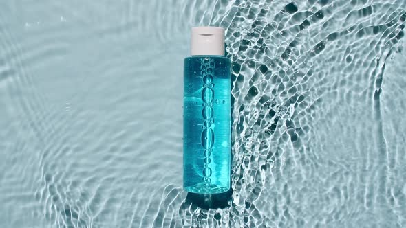 Cosmetic Bottle Vial for Oil Liquid Collagen Serum on Water Surface with Drops alt