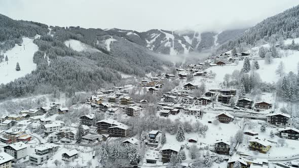Chalets Village On The Snowy Mountain In Alps