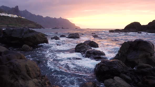 Ocean Waves Crash on Rocks in Sunset Light Playa Benijo Beach Tenerife Canary alt