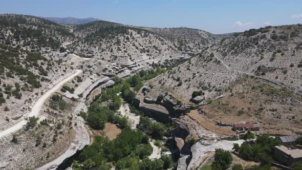 Treelined Creek Drone View Valley alt