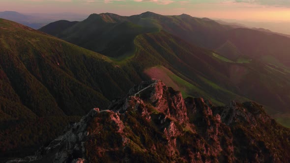 Cinematic Aerial Video of the Golden Hour on Top of a Mountain in a National Park at Sunrise
