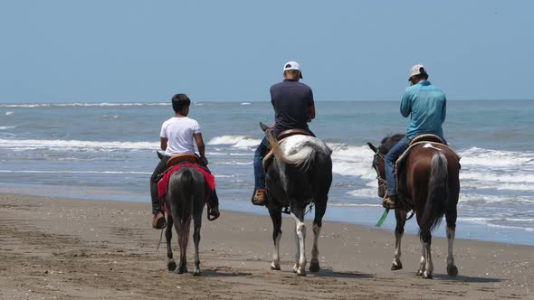 Country Family Riding Horse on the Seashore