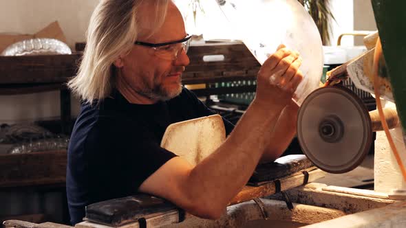 Glassblowers working on a glass alt