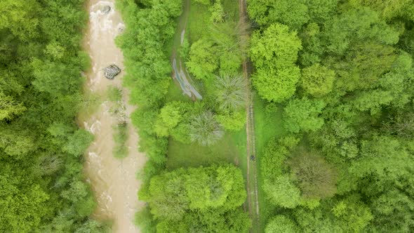 Descent of the drone to the mountain river alt