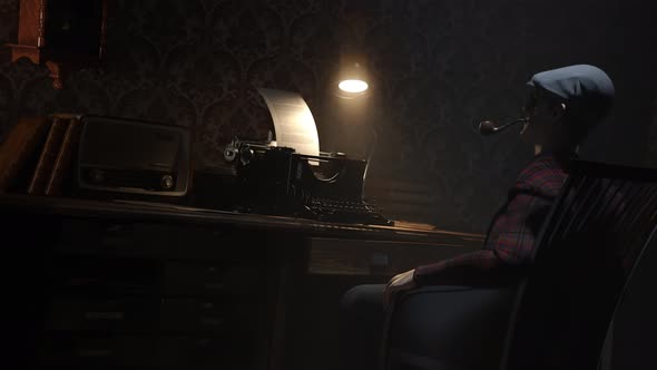 A writer seating in the rocking chair in front of the typewriter on his desk. alt