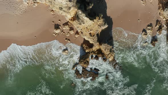 Aerial view of cliffs and the sand beach Praia da Balbina, Portugal by ...