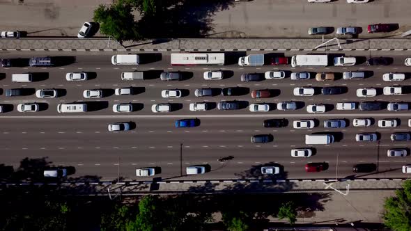 Aerial Top Down View of Urban Traffic Jam with Cars on Bridge alt