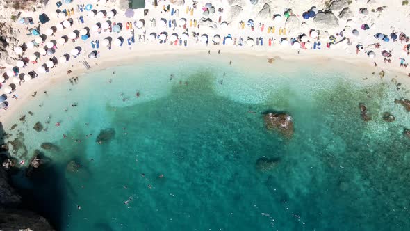 Aerial View of Lefkas Beach at Sunny Summer Day People Sunbathing Greece Vacation alt