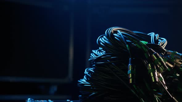 A Man Takes a Bunch of XLR Wires alt