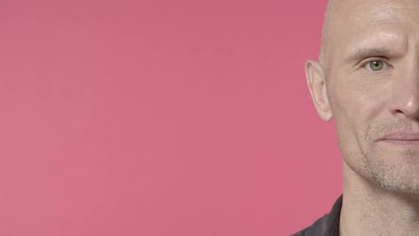 Closeup Halfface of Handsome Elderly Bald Guy with Bristle Middleaged Man Look Camera and Showing alt