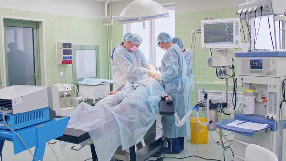 the Surgeon Performs a Surgical Operation