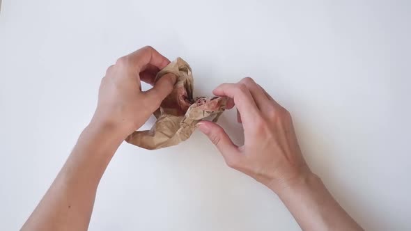 The Woman's Hands Straightened Smoothed the Drawing of a Red Heart on a White Table alt