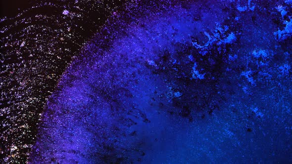 Dark Neon Blue Purple Black Colors Ink and Shiny Particles Macro alt