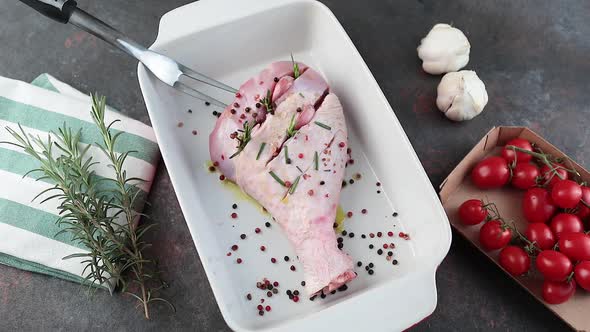 Raw turkey leg seasoned for roasting